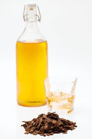 French oak chips heavy Ð¢oast to enrich the taste and color of alcohol.Selective focus with shallow depth of field.の写真素材