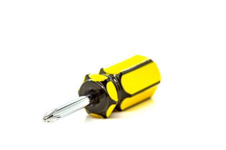 Small screwdriver with a star-shaped tip. Selective focus with shallow depth of field.の写真素材