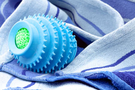 Silicone ball dryer removes moss from clothes and prevents creasing of clothes when drying. Selective focus with shallow depth of field.の写真素材