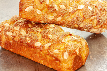 Traditional kozunak with almonds for the Easter holidays. Selective focus with shallow depth of...