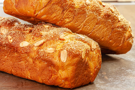 Traditional kozunak with almonds for the Easter holidays. Selective focus with shallow depth of...