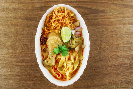 Thai Northern Style Yellow Curried Soup Noodle with chickenの写真素材