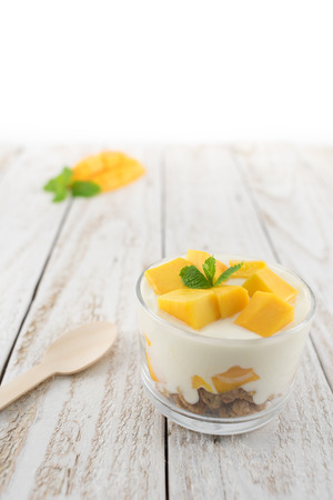 Homemade Mango Yoghurt Parfait with Granolaの写真素材
