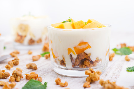 Homemade Mango Yoghurt Parfait with Granolaの写真素材
