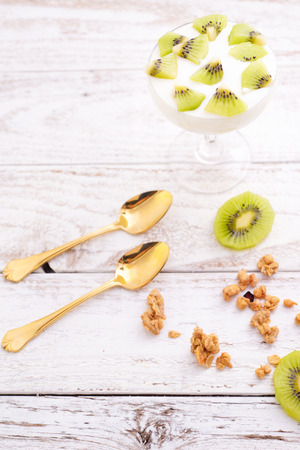 Homemade Kiwi Yoghurt Parfait with Granolaの写真素材