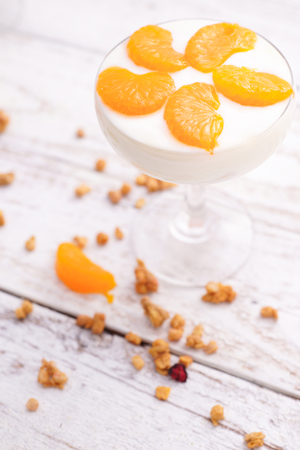 Homemade Orange Yoghurt Parfait with Granolaの写真素材
