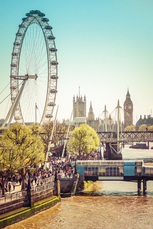 London, United Kingdom. April 9, 2017. London Landmark of The Eye with Many Tourist on The Sidewalk, The Westminster Bridge and The Festival Pier, Lambeth, Londonのeditorial素材