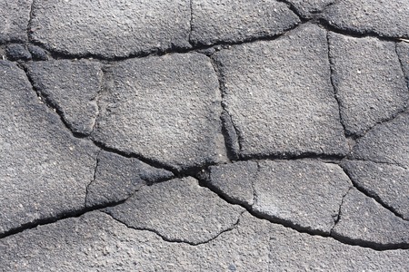 cracked semiwet asphalt with multiple cracks