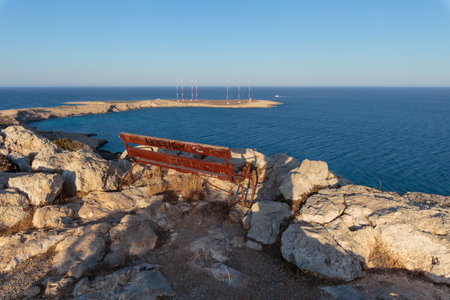 Bench overlooking the sea in Cyprusの写真素材