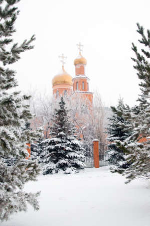 Church in the winter landscape.の写真素材