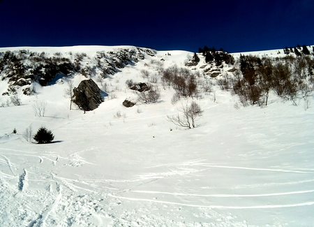 Snowy mountainsideの写真素材