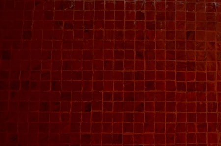 red wall tile at thai templeの写真素材
