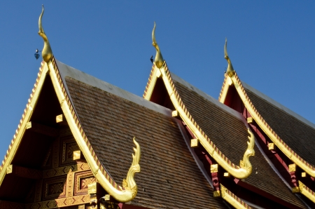 roof of buddhist temple in Thailandの写真素材