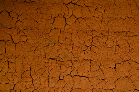 cracked clay wallの写真素材