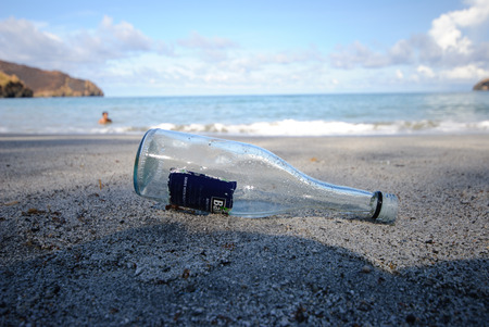 Anawangin Beach, Zambales, Philippines. Empty bottle, remains of past.