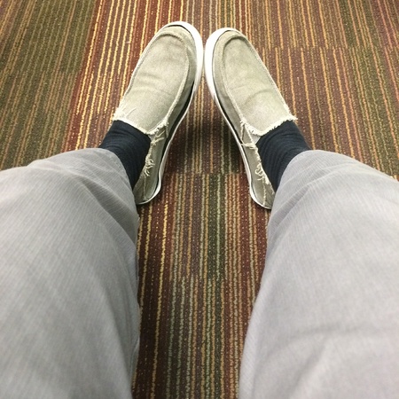 Stretching legs during breaktime at the officeの素材