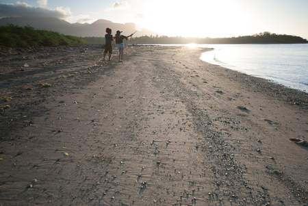 Morning walk at the beach of Lobo, Batangas, Philippines.の写真素材