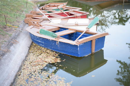 Wooden boat at the lakeside.の写真素材