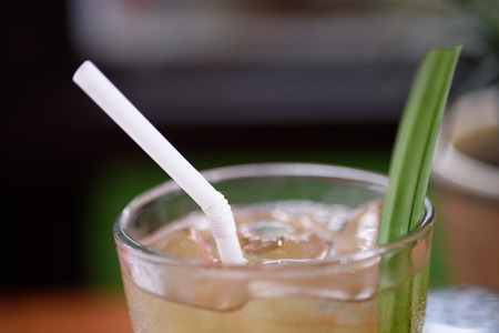A glass of drink on the table.の写真素材