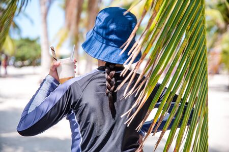 Cooling off from summer heat at the beach.の写真素材