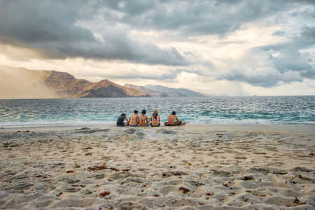 Group of friends enjoying their time at the shore of Zambales, Philippines.の写真素材
