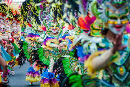 Colorful masks of street dacnce parade performer during Masskara Festival at Bacolod City, Philippines.のeditorial素材