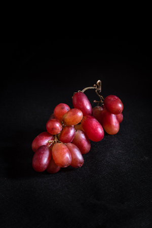 A bunch of Grapes in black backgroundの写真素材