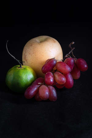 Assorted tropical fruits to welcome the new year.の写真素材