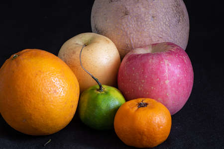 Assorted tropical fruits to welcome the new year.の写真素材