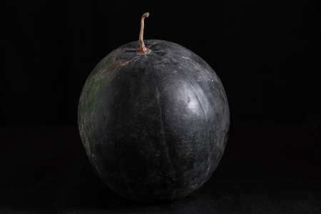 An isolaated Watermelon close-up in black background.の写真素材