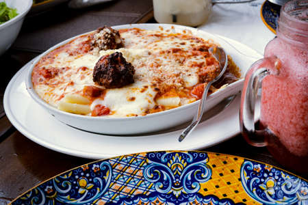 Lasagna served on table for lunch.の写真素材
