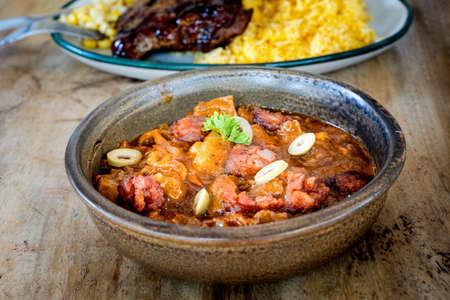 Single serve Callos with yellow rice.の写真素材