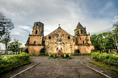 Miag-ao Church, Iloilo, Philippines. An 18th-century place of worship built by Spanish Catholic missionaries featuring Baroque architecture considered UNESCO world heritage site.の写真素材
