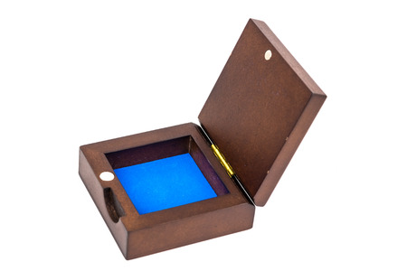 opened wooden mahogany case isolated on white backgroundの写真素材