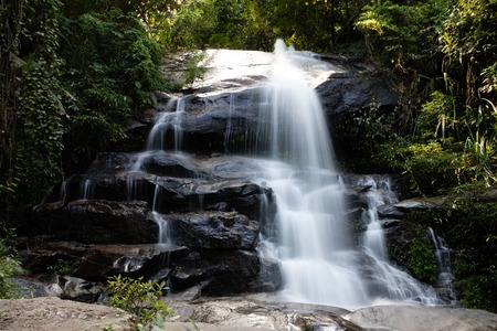 Long exposure of Montha Than waterfall in the jungle of Chiang Mai in northern Thailand