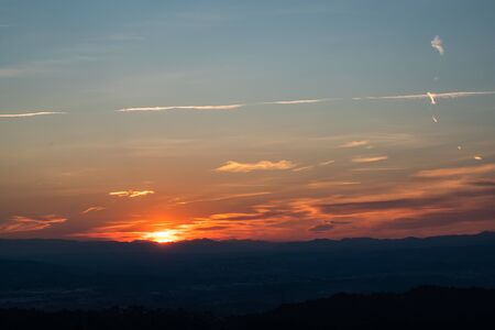 Sunset sky view with mountains and nature