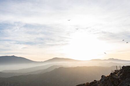 Sunset sky view with light fog and mountains in Cap de Creus, Catalunya