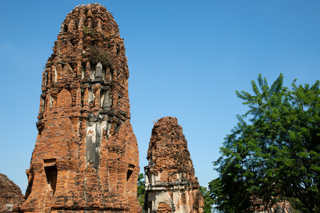 View from a pagoda of the temple ruins of Ayutthaya in Thailand with blue sky in the backgroundのeditorial素材