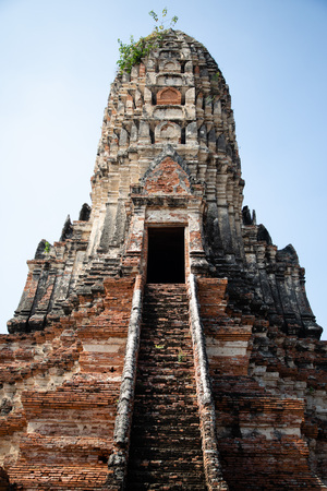 Front view from a pagoda of the temple ruins of Ayutthaya in Thailand with blue sky in the backgroundのeditorial素材