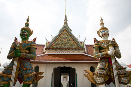 Front view of the entrance with two statues in both sides of the Emerald temple at Bangkokのeditorial素材