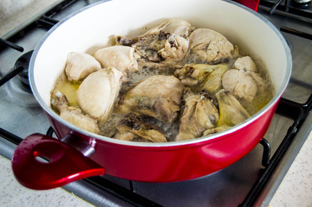 Chicken cooked in January, chicken cooked in the style of chicken, chopped chicken, chicken pieces, chicken pieces in pots, raw chickenの写真素材