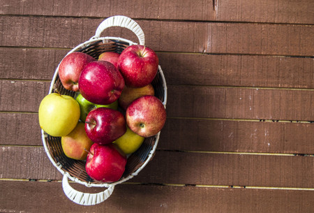 Basket of red apples, a basket full of applesの写真素材