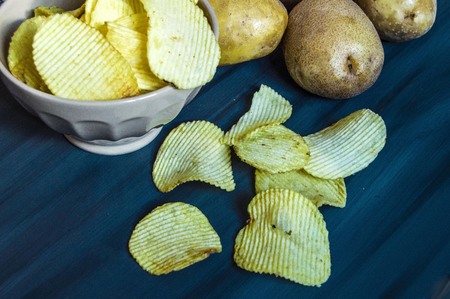 Potato and potato products, fried potato slices, serrated fried potato slices, fried potato chipsの写真素材
