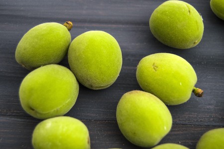 Green apricot pictures, immature sour apricots, the most beautiful and the most sour green.の写真素材
