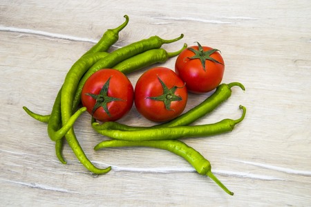 Tomato-wrapped green pepper, pepper and tomato friendshipの写真素材