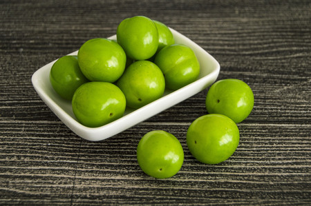 Plums in plateの写真素材