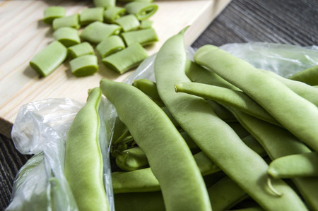 Fresh green beans ready to eat, green bean with knife,