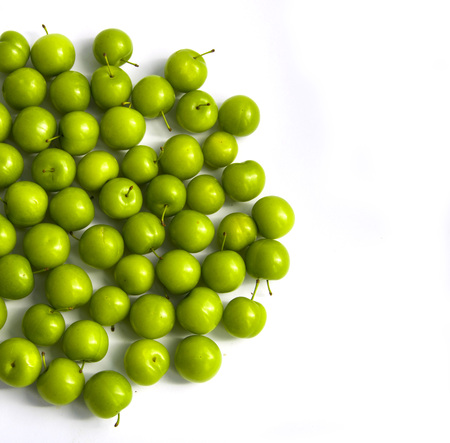 Quality and natural life-giving green sour plumsの写真素材