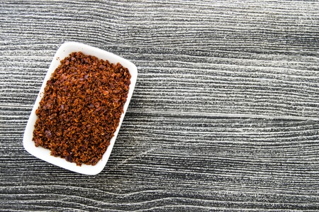 Dry red pepper on the white ground, pictures of natural and organic red hot peppers,