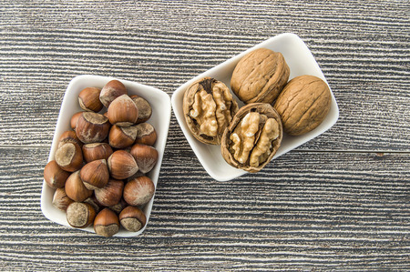 walnut and shelled hazelnut pictures side by side in a separate plate